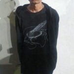 Uno de los asaltantes detenidos.