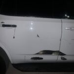 El vehículo de la Esolta del Fisal General, golpeado por el agresor